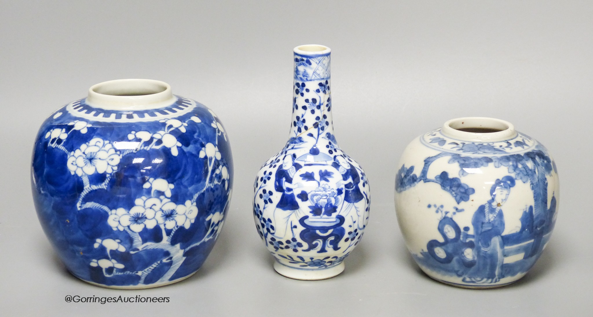 A Chinese blue and white 'ladies' jar, a 'boys' vase and a prunus jar, late 19th / early 20th century, tallest 15cm